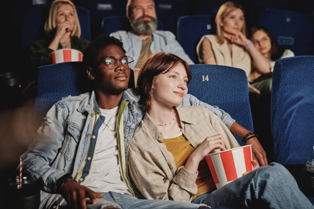 Young Couple At Cinema